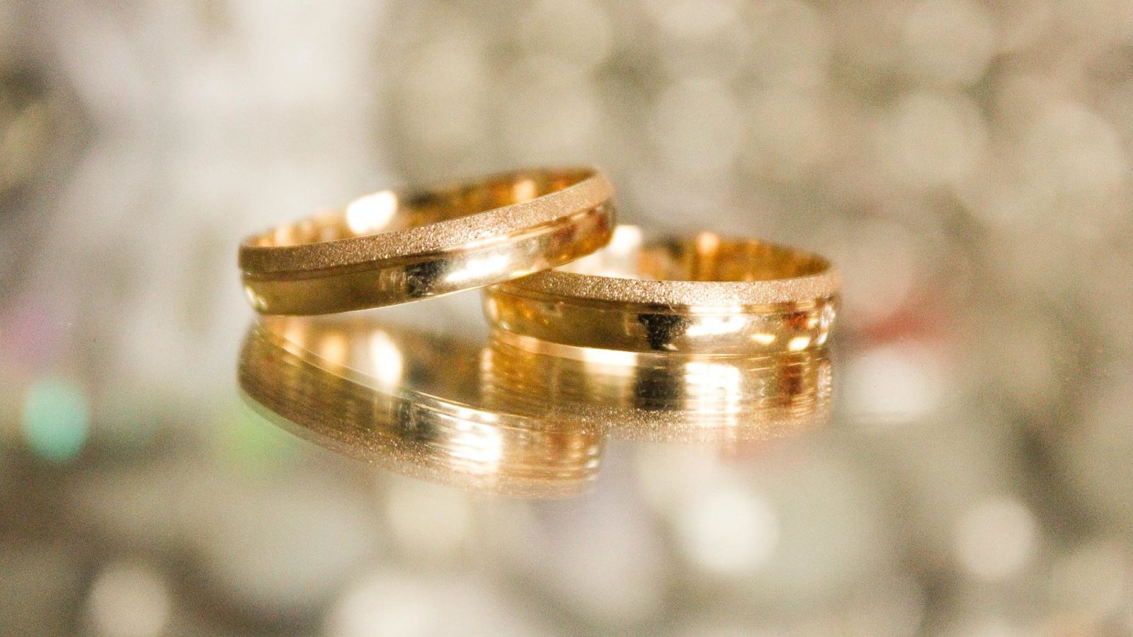 two gold wedding bands